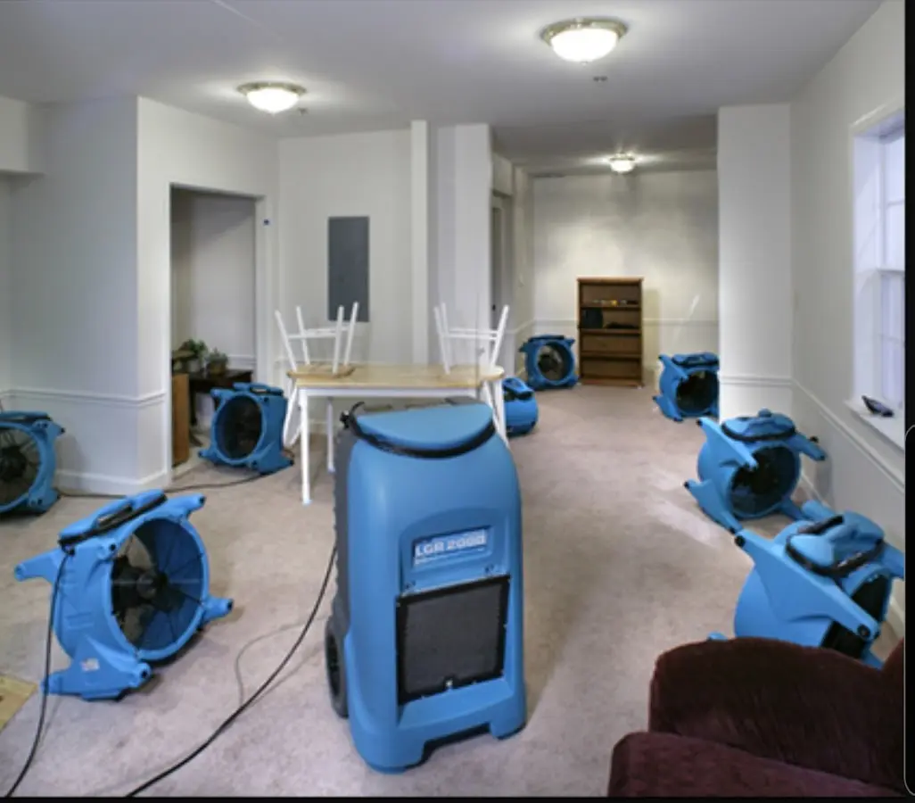 Air movers and dehumidifier setup for Water Damage Restoration in Kent